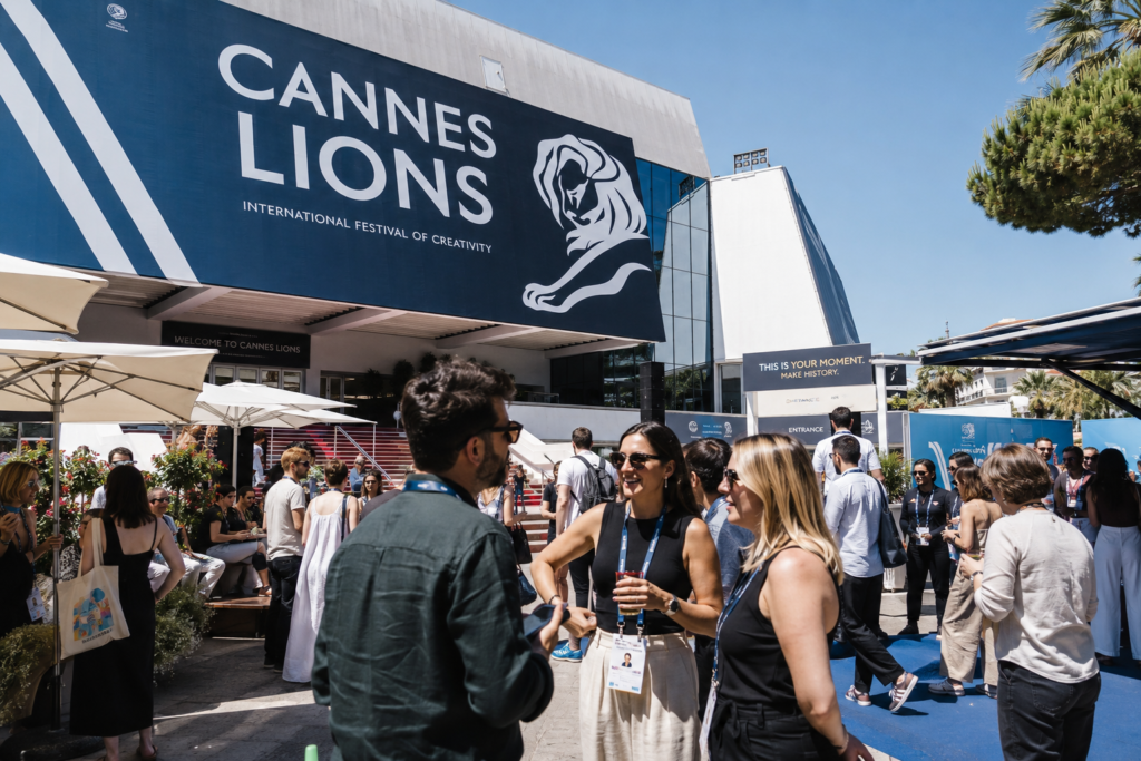 Photography of the Palais des Festivals during Cannes Lions creative professionals networking outside modern branding